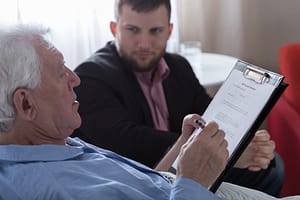 Patient,Suffering,For,Terminal,Cancer,Signing,The,Testament