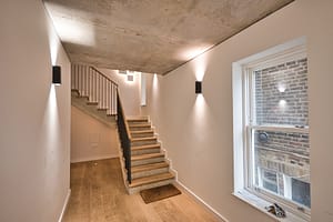 Contemporary,Apartment,Interior,Design,With,Concrete,Ceiling,And,Wood,Flooring